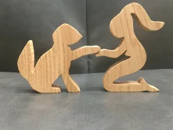 Female Figure Kneeling with Dog