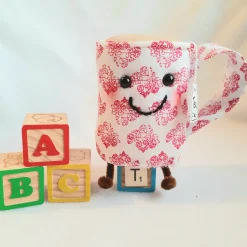 Red And White Cup Of Tea