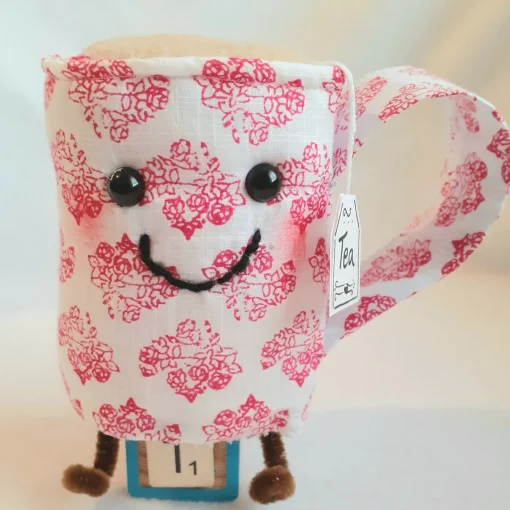 Red And White Cup Of Tea