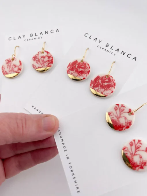 Round Red China Dangles with gold tips