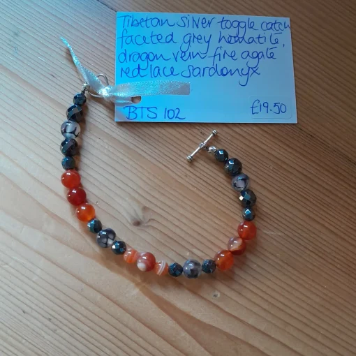 Tibetan Silver Toggle Catch Bracelet with Faceted Grey Hematite, Drago